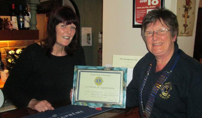 Certificate being presented to Rampant Cat